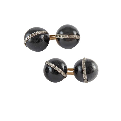 Pair of early 20th century onyx cabochon and diamond cufflinks, French c.1910, domed onyx panels,